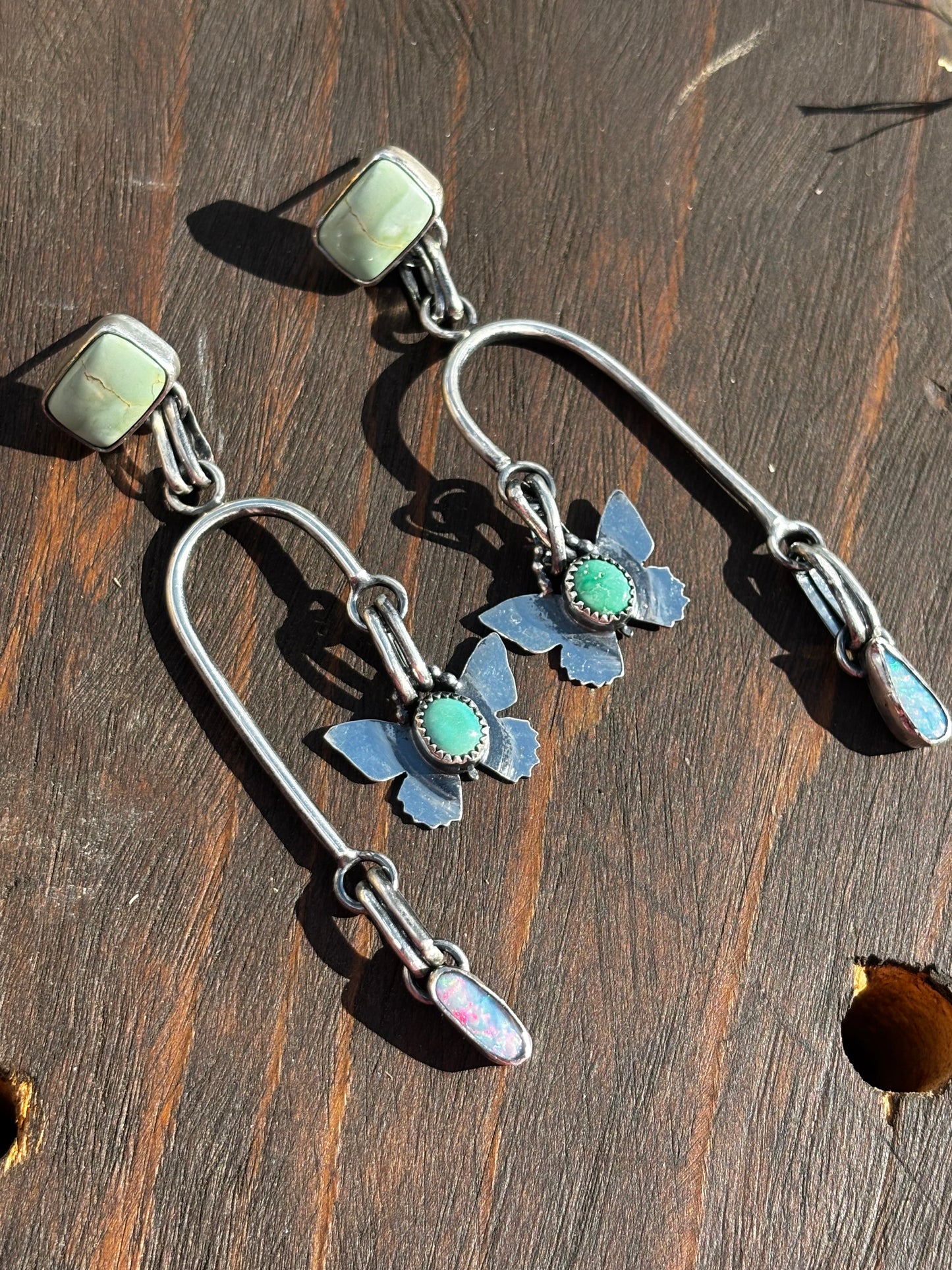 Asymmetrical butterfly earrings